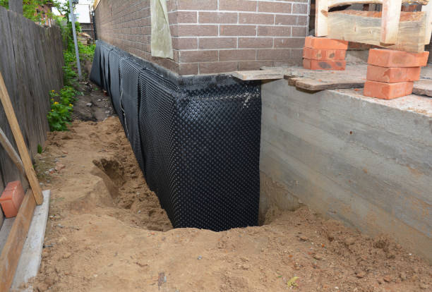 Happy homeowners after waterproofing job in Hortonville
